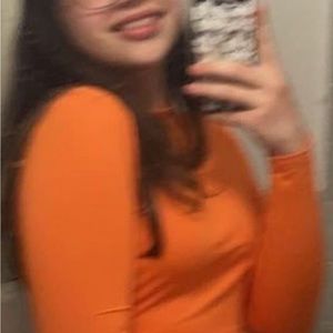 Orange “turtleneck” cropped shirt
